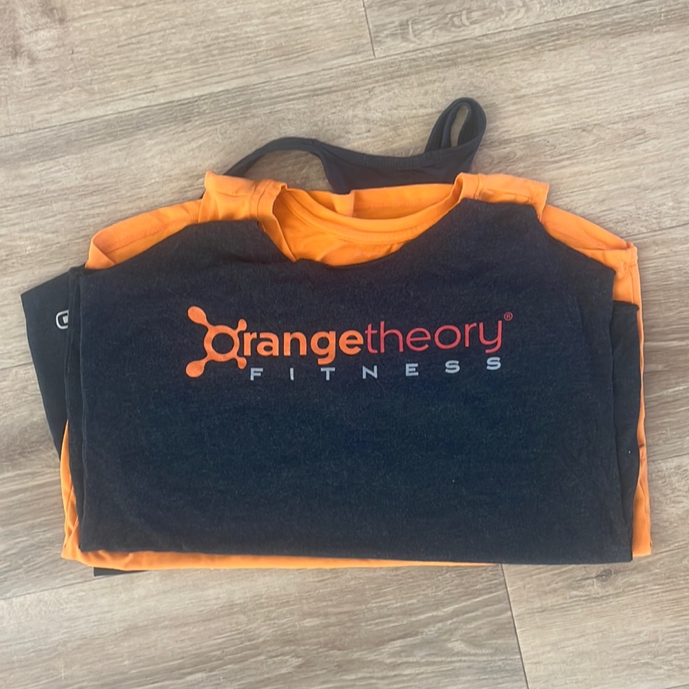 Three (3) OrangeTheory (OT) tanks, all size medium. BONUS: OT Hat